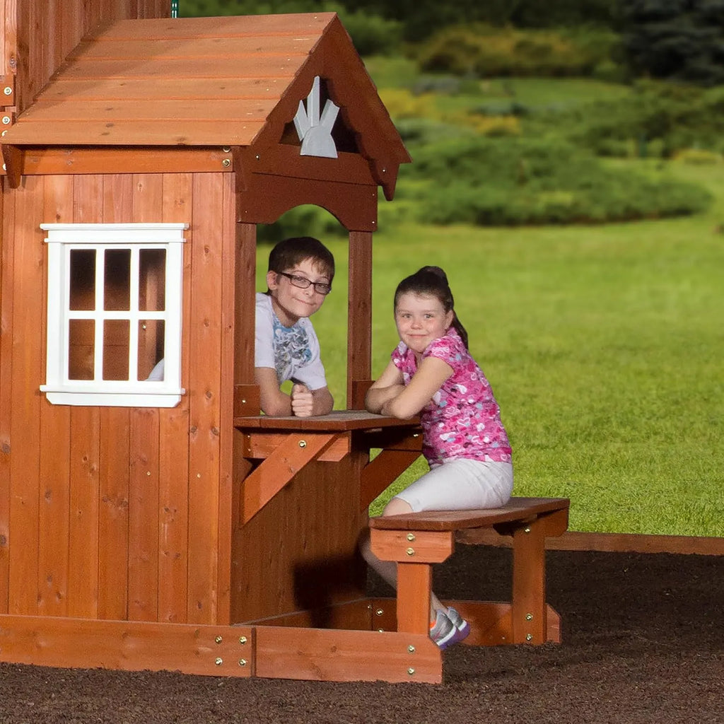 Backyard Discovery Shenandoah Cedar Wood Swing Set with Wave Slide, Raised Clubhouse, Playhouse, Play Kitchen, Belt Swings, Trapeze, Rock Wall, Ladder, Picnic Table, Full Door, Outdoor Playset