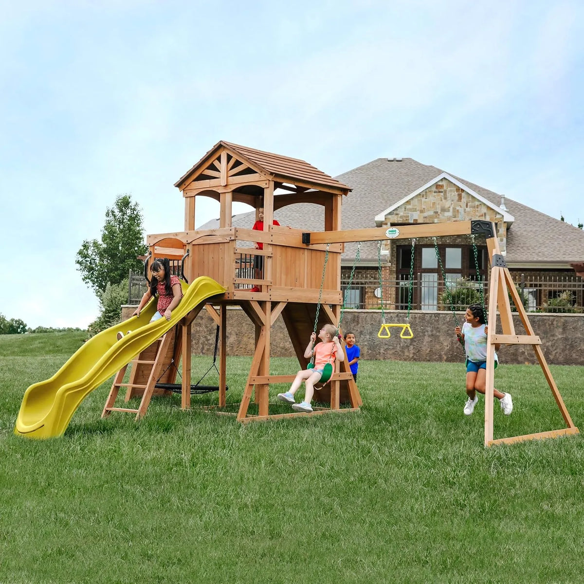 Backyard Discovery Sterling Point Cedar Wood Swing Set with Wave Slide, Raised Clubhouse, Wooden Bridge, Rock Wall, Belt Swings, Web Swing, Trapeze, Balcony, Climbing Wall, Ladder, Outdoor Playset