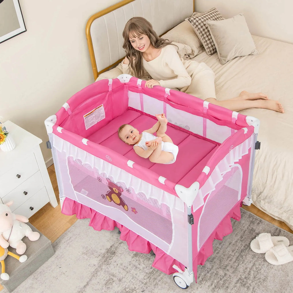 Costway Baby Playard Crib Bed 4 in 1 Portable with Changing Table Canopy Music Box Pink