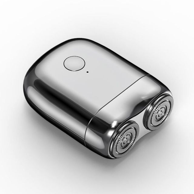 Compact Electric Shaver with Magnetic Charging Base and IPX7 Water Resistance